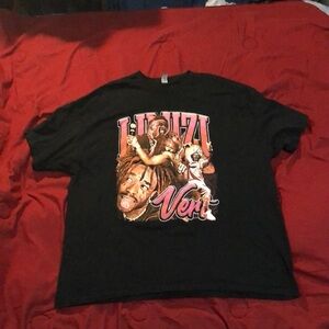 it’s an XL Lil Uzi Vert Pink Tape tour shirt. brand is gildan